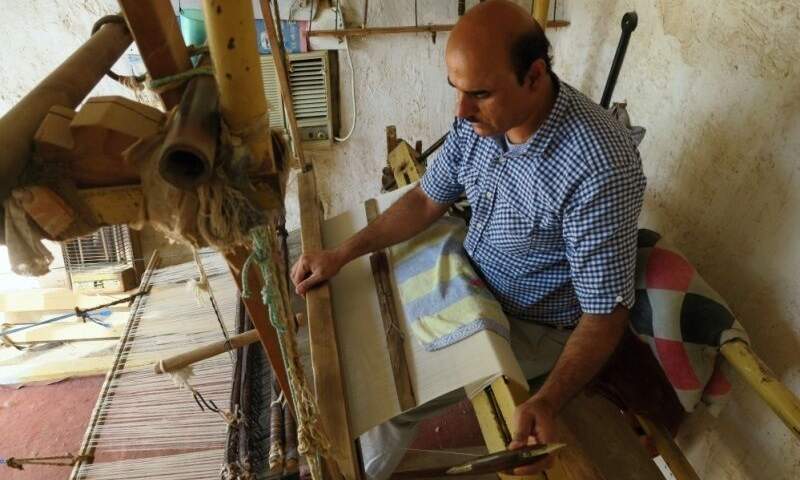 روستای بحیری بوشهر نامزد ثبت ملی هنر صنعت عبا بافی شد
